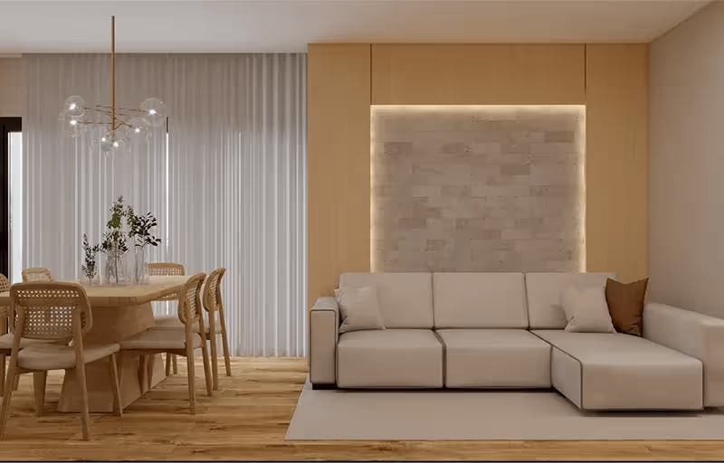 Sala de estar moderna com sofá bege em L, almofadas marrons, parede de destaque com iluminação embutida e mesa de jantar de madeira com cadeiras.